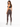 A woman wearing form-fitting brown leggings and a gray crop top, standing with her back to the camera.