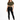 A woman stands confidently in a cropped olive green top tied at the waist, paired with black leggings and white sneak...