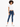 A model poses in a cropped white top paired with dark blue skinny jeans and white sneakers.