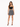 A model poses in a fitted black crop top and a flared skirt with a bold animal print pattern.