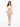 A woman walks confidently in a fitted off-the-shoulder top and high-waisted beige trousers, paired with black heels.