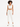 A model poses in a white cropped top and matching joggers, paired with white sneakers and a stylish hairstyle.