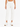 Lightweight, white jogger pants with side cutouts, paired with white sneakers for a casual look.