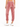 Soft, pink velvet joggers with an elastic waistband and cuffed ankles, paired with white sneakers.