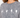 A close-up of a woman wearing a gray, oversized tee featuring hand signs spelling "LOVE" in white.