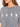 A close-up of a woman wearing a gray, oversized tee featuring hand signs spelling "LOVE" in white.