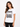 A woman wearing a white t-shirt featuring a zebra print design and stylish text in a square graphic.