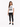 A woman stands wearing a white graphic tee with a zebra print design, paired with black skinny jeans and sneakers.