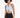 Light blue ribbed crop top with a keyhole cutout and metal accents, paired with high-waisted black jeans.