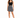 A woman stands confidently in a fitted black top and a flared black and white patterned skirt, paired with strappy he...