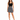 A woman stands confidently in a fitted black top and a flared black and white patterned skirt, paired with strappy he...