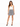 A model poses in a fitted white top and a flared black and white leopard print skirt, paired with strappy heels.