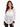 A model wearing a sheer white lace top with a black collar and button-down front, styled with black leggings.