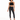 A model poses in a black lace halter top and high-waisted black skinny jeans, paired with strappy heels.