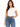 A woman wearing a fitted white t-shirt and high-waisted blue jeans, accessorized with a brown belt.
