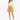 A model wearing a long-sleeve cream blouse paired with a mustard skirt and black strappy heels.