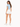 A woman with long, wavy hair wears a light blue cropped top and white shorts, facing away from the camera.