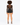 A model with curly hair wears a sheer long-sleeve top and high-waisted black shorts, showcasing a stylish back view.