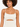 A model showcases a light-colored bodysuit with thin straps and a stylish cut-out detail at the waist.
