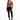 A model poses in a fitted long-sleeve top with a V-neck and cut-out details, paired with black skinny jeans and sneak...
