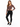 A model poses in a fitted brown long-sleeve top paired with black skinny jeans and black sneakers.
