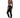 A model poses in a fitted long-sleeve top with a cutout design, paired with black skinny jeans and sneakers.