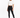A model wearing black leggings paired with a cropped white t-shirt and stylish black boots.