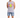 A man stands wearing a sleeveless gray shirt and distressed denim shorts, showcasing a casual summer look.