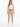 A model wearing beige cropped pants with a braided brown belt and white sneakers, posing against a plain background.