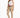 A woman poses in light beige pants, a white crop top, and white sneakers, showcasing a casual outfit.