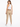 A woman stands with her back to the camera, wearing beige pants and a white tank top, paired with a braided belt.
