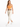 A model walks confidently in light-colored pants paired with a fitted orange top and white sneakers.