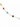 Delicate gold chain anklet featuring colorful beads in red, blue, black, and light blue.