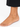 Delicate gold anklet adorned with colorful beads, elegantly displayed on a bare ankle.