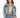 A woman models a light blue cropped denim jacket over a fitted green top, paired with high-waisted jeans.
