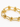 Gold bracelet featuring interlinked oval shapes and spherical accents, creating a modern and stylish design.