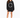 A woman stands wearing a black oversized sweatshirt with a circular white text design, paired with black chunky boots.