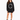 A woman stands wearing a black oversized sweatshirt with a circular white text design, paired with black chunky boots.