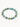 A beaded bracelet featuring turquoise-colored stones and gold hexagonal accents.