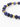 A close-up of a beaded bracelet featuring deep blue stones and gold geometric accents.