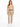 A woman stands confidently in a fitted beige crop top and light beige high-waisted pants, paired with white sneakers.