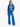 A model wearing loose-fitting blue pants with an elastic waistband and side pockets, paired with a matching top.
