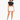 A model poses in a black cropped top and white high-waisted shorts, paired with white sneakers.