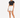 A model poses in a black cropped top and white high-waisted shorts, paired with white sneakers.