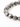 A close-up of a beaded bracelet featuring gray and black speckled stones interspersed with smooth black beads.