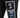 Black sweatpants featuring a graphic patch with a stylized bust and abstract blue design on the thigh.