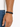 A close-up of a hand wearing a black braided bracelet with a sleek metal clasp, showcasing a minimalist design.