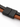 Close-up of a dual-strand bracelet featuring black and brown leather with a sleek black clasp.