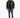 A man stands wearing a black puffer coat, black shirt, distressed jeans, and sneakers against a white background.