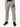Gray sweatpants featuring a large black logo, paired with black athletic shoes.